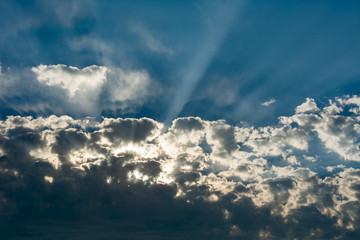 Obraz premium Sun Through Clouds