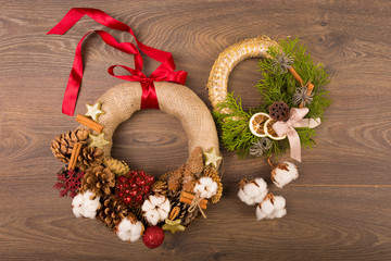 Christmas wreath on a wooden background