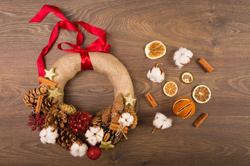 Christmas wreath on a wooden background