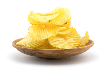 Potato chips in wooden plate