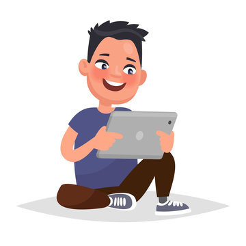 Boy holding a tablet in hands. Vector illustration in cartoon st
