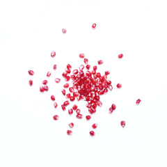 pomegranate seeds on white background