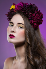 Beautiful girl with flowers on head