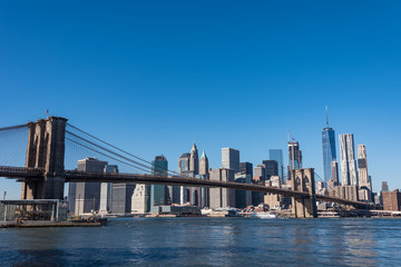 Obraz na płótnie Canvas Brooklyn bridge and Skyscrapers in New York