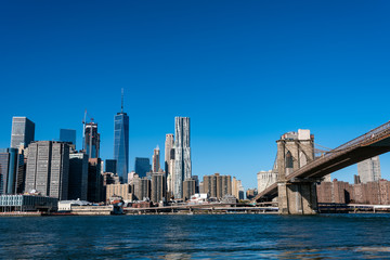 Fototapeta na wymiar Brooklyn bridge and Skyscrapers in New York
