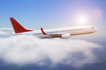 Plane flying over the cloud