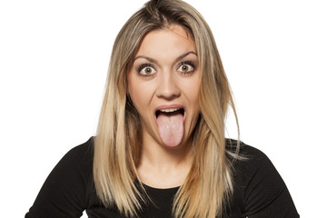 silly young woman making funny faces