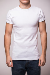 Front t-shirt on a young man isolated