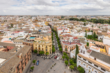 Fototapeta na wymiar Aerial view of Sevilla in cloudy weather