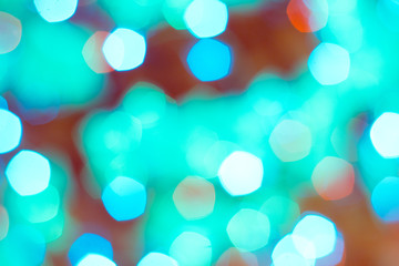 Colorful lights on red background. holiday bokeh. Abstract Christmas background