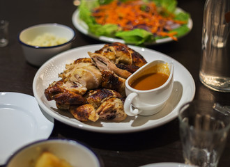 roast chicken display on table restaurant. Selective focus, shallow depth of field.