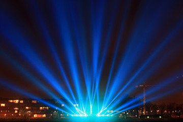 Fototapeta na wymiar light beams on the city promenade