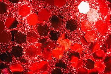 Red christmas texture. Shiny background.