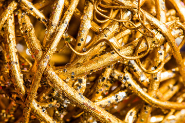 Gold wood branch. Christmas gift background. Close up.