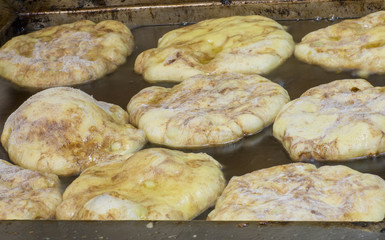 Apple Cinnamon Fritters Frying In The Fryer