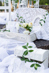 beautiful delicate items and interior decoration for home and decorating photo zone, frames, beads, bottles, bags and boxes, flowers, roses