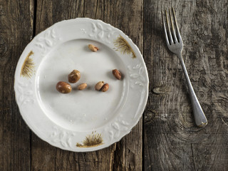 pits from olives on a plate