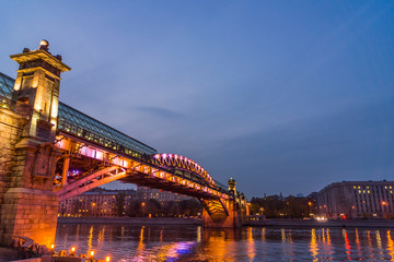 Naklejka premium Autumn 2013. Russia. Moscow. Central Park of Culture and Rest named after Gorky. Embankment of the Moscow river. Andreevsky Bridge. The Evening.