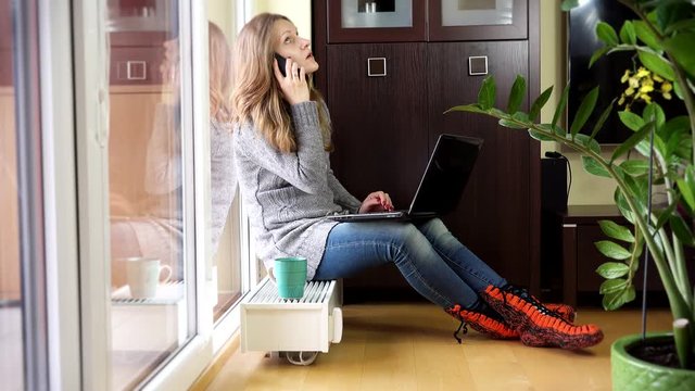 Happy free lancer business woman organize her works at home.