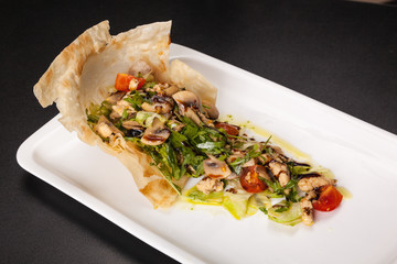 mushroom salad with tomatoes and Arugula