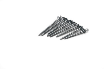 Screws with hexagonal head on a white background