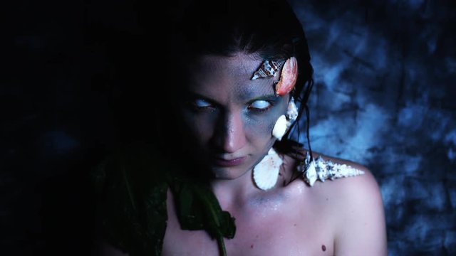 4k Halloween Shot of a Horror Woman Mermaid Posing Nude with White Eyes