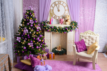 Fototapeta premium Christmas tree decorated in purple toy. background with gifts