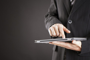 Businessman using a tablet