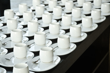 Group of coffee cups.empty cups for coffee.Many rows of white cup for service tea or coffee in breakfast at buffet event.white cup in Catering and Cocktail.