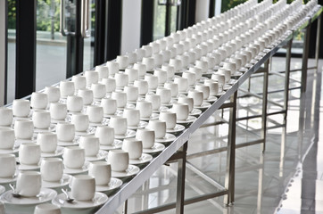 Group of coffee cups.empty cups for coffee.Many rows of white cup for service tea or coffee in breakfast at buffet event.white cup in Catering and Cocktail.