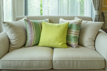 Sofa with colorful pillows in living room