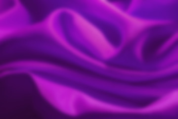 Obraz premium Abstract dark violet background of colorful silk cloth