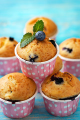 blueberry muffins in pink cases