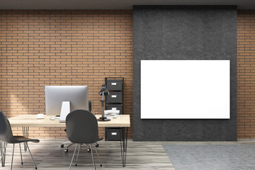 Front view of horizontal poster on black wall in CEO study