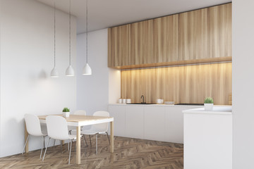 Side view of a light wood kitchen interior