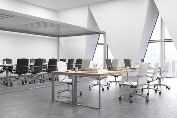 Side view of an open office with triangular windows