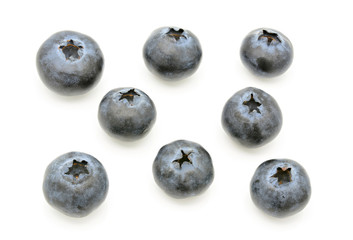 Close-up of fresh blueberry on white