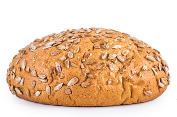 Round bread with seeds isolated on white background