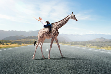Girl saddle giraffe . Mixed media - obrazy, fototapety, plakaty