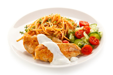 Fried chicken fillet, pasta and vegetables 