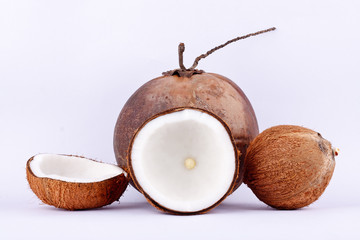 coconut half clipping path for coconut milk and brown coconut shell and ripe coconut  on white background healthy fruit food isolated
