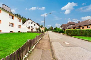 Fototapeta na wymiar Wide angle view of a street in a German village