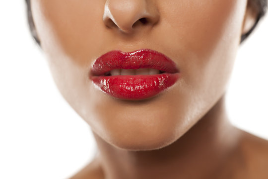 beautiful feminine lips with red lipstick