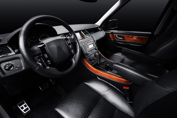 Fototapeta na wymiar Luxury car leather interior, black studio background