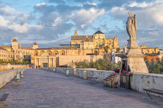 Sculprure staying on Roman bridge of Cordoba