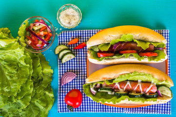 Two hot dog on a bright background