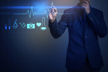 Closeup image of businessman drawing heart symbol at interactive