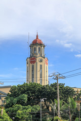 Fototapeta na wymiar The clock tower of the Manila City Hall in Manila, Philippines