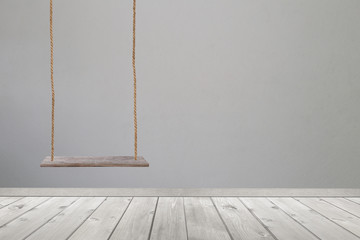 wooden swing and wood floor.