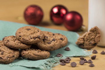 Cookies and Milk for Santa / Cookies and milk with Christmas decoration on a wooden background